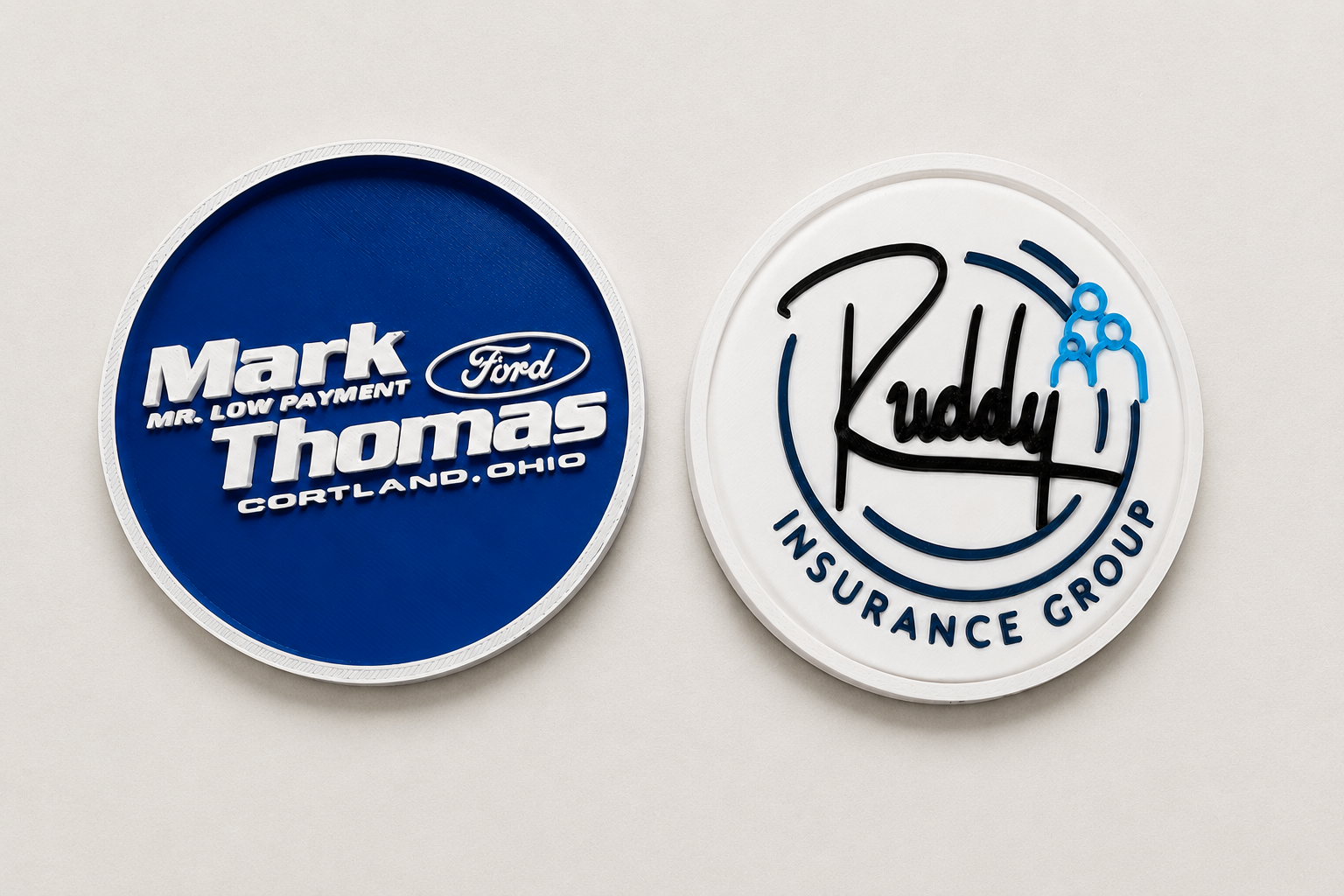 Custom Mark Thomas Ford and Ruddy Insurance Group coasters.