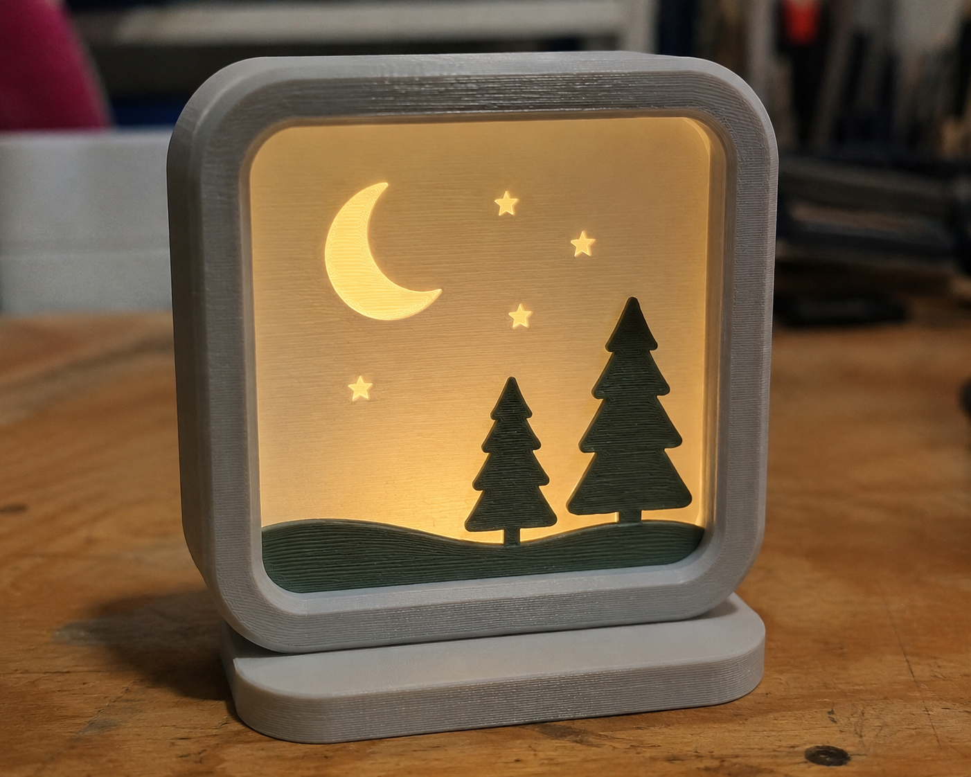 An illuminated OliPoly nightlight.