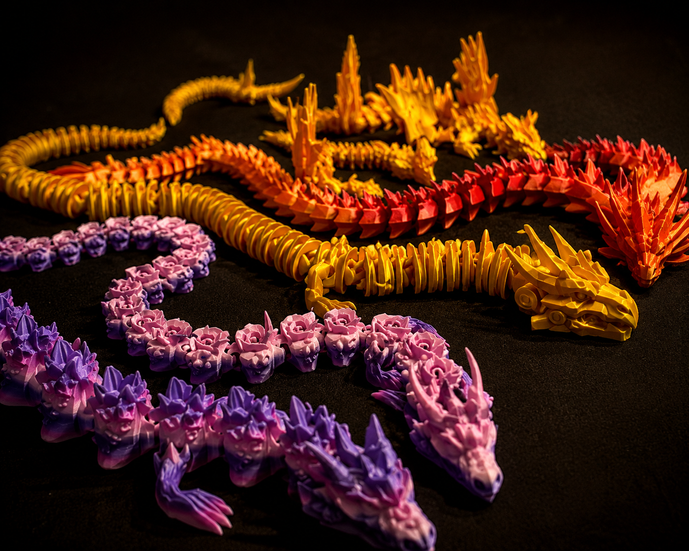 Colorful articulated dragon prints on a market display table