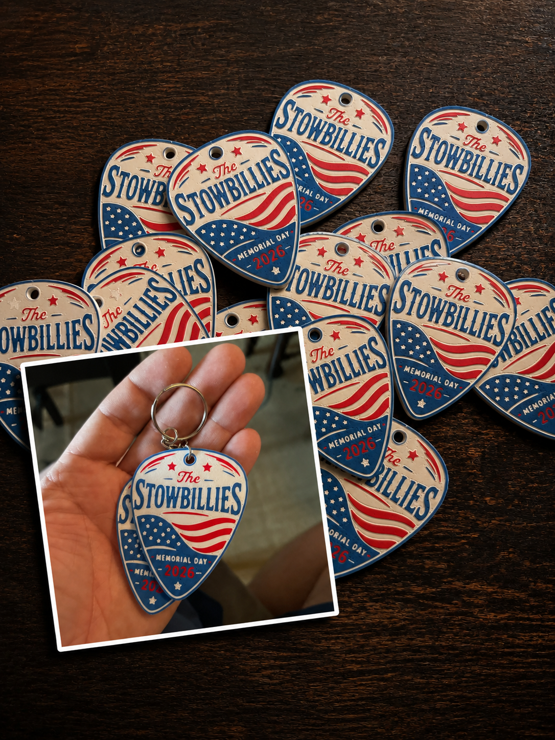 A styled pile of custom Stowbillies Memorial Day keychains with a close-up inset.